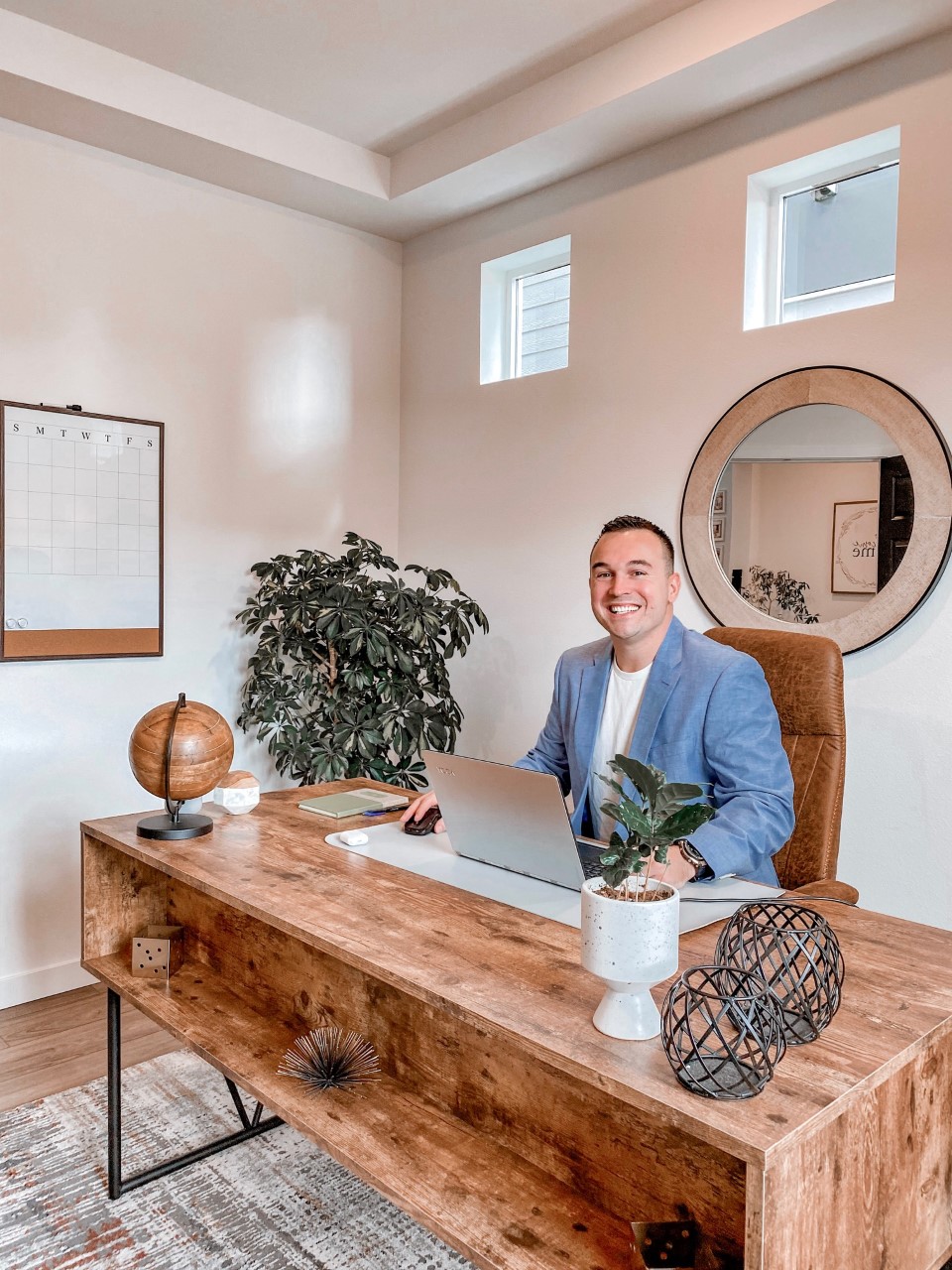 Tyler Freed Realtor at Modern Wood Desk